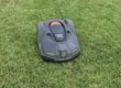 Image of a Husqvarna lawn power mowing a lawn