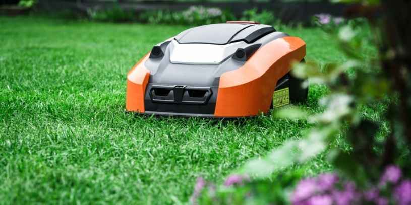 Self Mowing Mower A self mowing mower trimming grass.