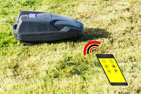 A remote control lawn mower maintaining a field.