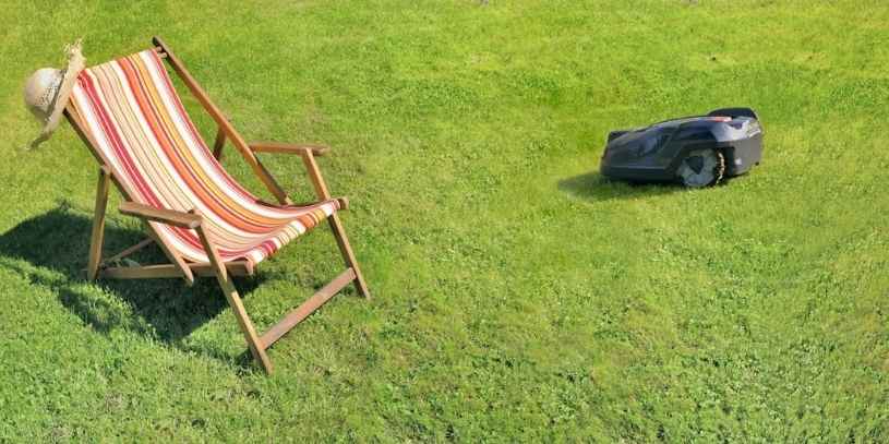 Segway Robot Mower A Segway robot mower operating near a lawn chair.